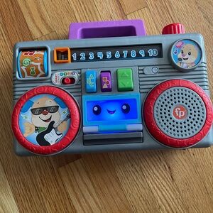 Fisher-Price Laugh & Learn musical boombox toy